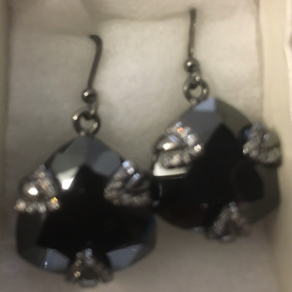 Onyx and diamond dangling earrings